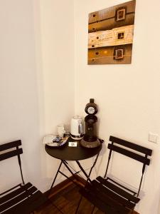 Příslušenství pro přípravu čaje a kávy v ubytování Pension Eichel + 92 fotografií