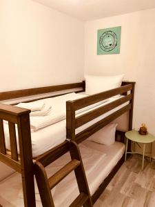 Postel nebo postele na pokoji v ubytování Pension Eichel