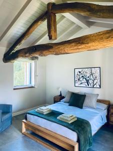 En eller flere senge i et værelse på Antica Cascina - Corgeno