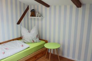 Postel nebo postele na pokoji v ubytování Ferienwohnung Arne + 14 fotografií