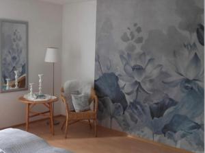 Postel nebo postele na pokoji v ubytování 4 Sterne Ferienwohnung Rosengarten nur für Urlaubsgäste