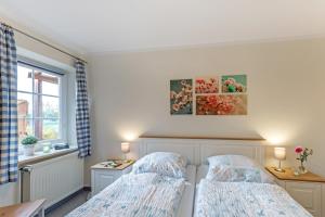 Postel nebo postele na pokoji v ubytování Ferienhof Marquardt Fewo Terrassenstübchen