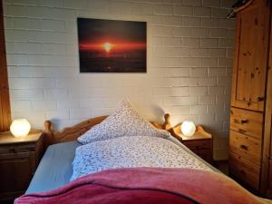 Postel nebo postele na pokoji v ubytování Ferienhaus Martina