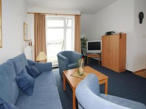 TV a/nebo společenská místnost v ubytování Ferienresidenz Haffblick in Boltenhagen