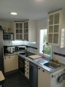 Kuchyňa alebo kuchynka v ubytovaní Penthouse