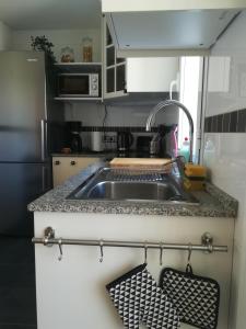 Kuchyňa alebo kuchynka v ubytovaní Penthouse + 16 fotografií