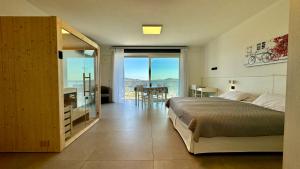 En eller flere senge i et værelse på Appartamenti Annachiara