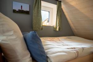 Postel nebo postele na pokoji v ubytování Ferienhaus Lee