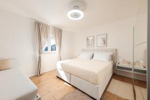 Postel nebo postele na pokoji v ubytování Apartman BILI