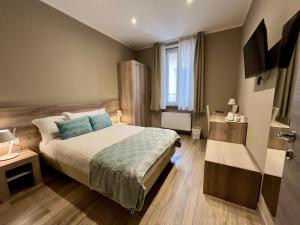 Postel nebo postele na pokoji v ubytování Delight Rooms