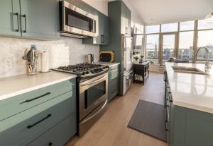 Kuchyň nebo kuchyňský kout v ubytování Victoria's SEA-Cret