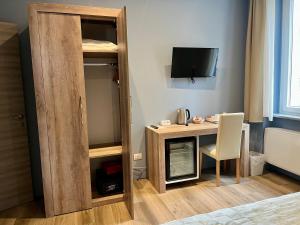 TV a/nebo společenská místnost v ubytování Delight Rooms