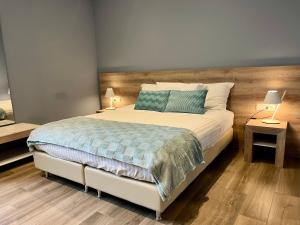 Postel nebo postele na pokoji v ubytování Delight Rooms