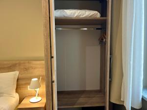 Postel nebo postele na pokoji v ubytování Delight Rooms