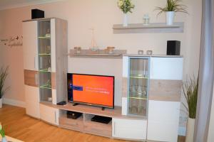 TV a/nebo společenská místnost v ubytování Ostwind