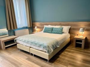Postel nebo postele na pokoji v ubytování Delight Rooms