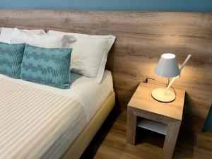 Postel nebo postele na pokoji v ubytování Delight Rooms