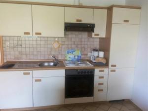 Kuchyň nebo kuchyňský kout v ubytování Haus Tötel DHH 3