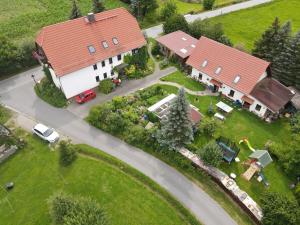 an aerial view of a house with a red roof at Kottmar in Herrnhut