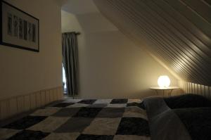 Postel nebo postele na pokoji v ubytování Traumfängerhaus Elfen + 4 fotografie