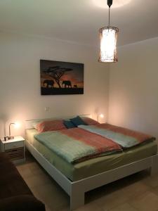 Postel nebo postele na pokoji v ubytování Ferienhaus "Maria"