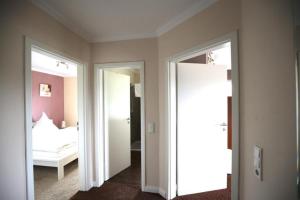 Postel nebo postele na pokoji v ubytování Ferienhaus Easy Holiday am Ritzhagen ehem Heinrichs