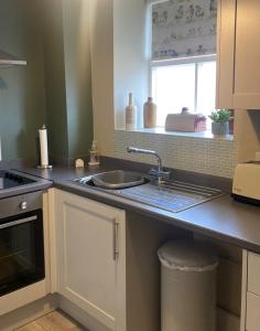 Η κουζίνα ή μικρή κουζίνα στο Bedale Cottage