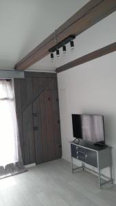 Μια τηλεόραση ή/και κέντρο ψυχαγωγίας στο Wohnung Nr 4