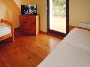 Łóżko lub łóżka w pokoju w obiekcie Holiday Home near Baltic Sea Beach