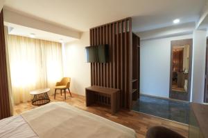 Postel nebo postele na pokoji v ubytování Hotel City IN