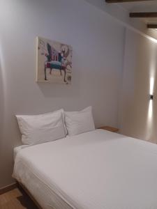 Postel nebo postele na pokoji v ubytování Stylish Studio Apartment - 8F House