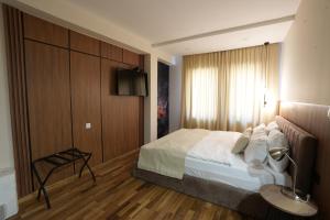 Postel nebo postele na pokoji v ubytování Hotel City IN
