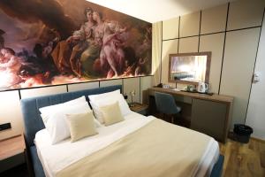 Postel nebo postele na pokoji v ubytování Hotel City IN