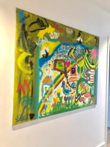 a painting hanging on a wall at Port Marina "Schlagseite" in Bremerhaven