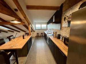 Kuchyňa alebo kuchynka v ubytovaní Loft Apartment 122qm Center Sea view Rijeka