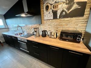 Kuchyňa alebo kuchynka v ubytovaní Loft Apartment 122qm Center Sea view Rijeka