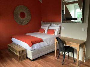 Postel nebo postele na pokoji v ubytování Manoir de la Croix-Sonnet
