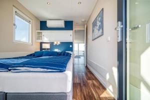 Ένα ή περισσότερα κρεβάτια σε δωμάτιο στο Hausboot Mein Lieblingsboot