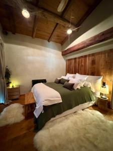 En eller flere senge i et værelse på Demeure moresca