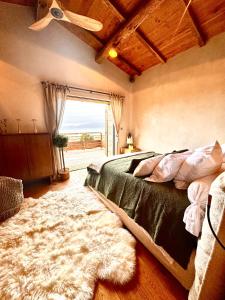 En eller flere senge i et værelse på Demeure moresca