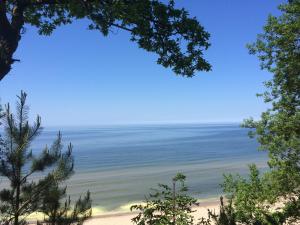 a view of the ocean from a bluff at Wy & Spa in Pobierowo