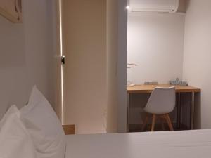 Postel nebo postele na pokoji v ubytování Stylish Studio Apartment - 8F House