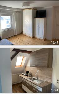 a kitchen with white cabinets and a sink in a room at Ferienwohnung im Zanderhaus in Sabel +5 photos
