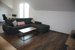 Ruang duduk di Ferienwohnung Waldblick