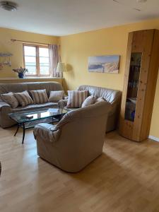 Un lugar para sentarse en Haus Wildgans - Ferienwohnung Sonnenblume