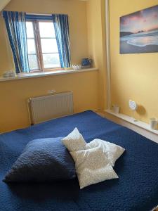 Una cama o camas en una habitación de Haus Wildgans - Ferienwohnung Sonnenblume