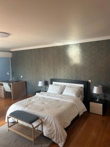 Postel nebo postele na pokoji v ubytování Anjos’home