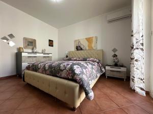 Ένα ή περισσότερα κρεβάτια σε δωμάτιο στο La Perla Di Campofelice