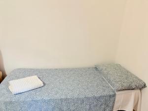 Postel nebo postele na pokoji v ubytování NeboRooms