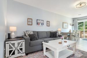 a living room with a couch and a table at Platte River Play Lovely 2bdr Barnhouse 2852 in Beulah